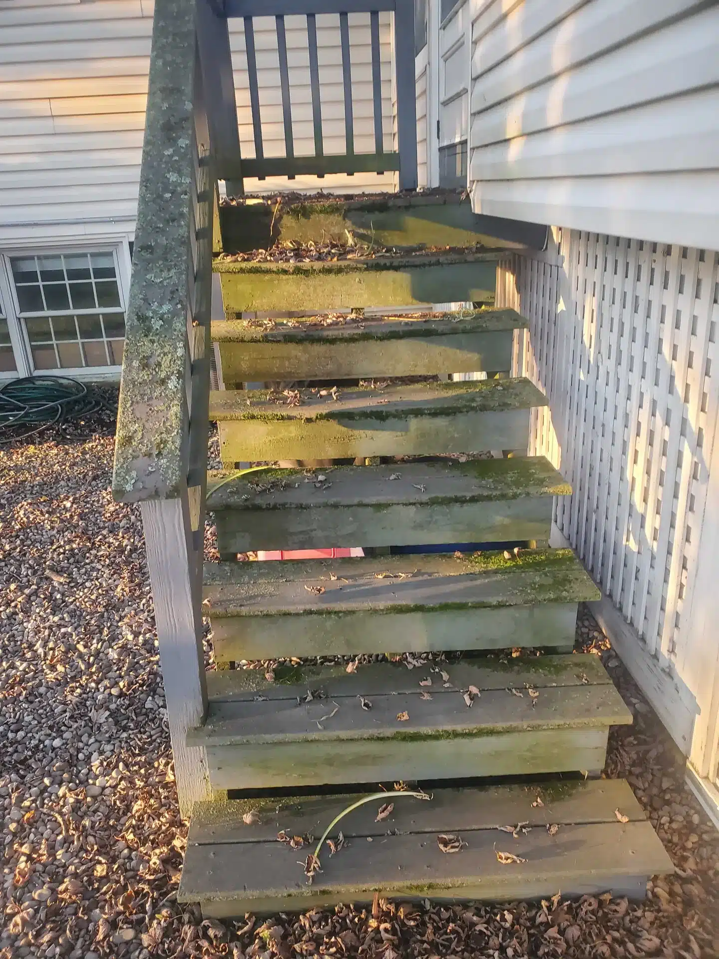 Painted deck stairs before cleaning